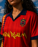 Close-up of the Roja Football Jersey crest, collar, and front graphic detail